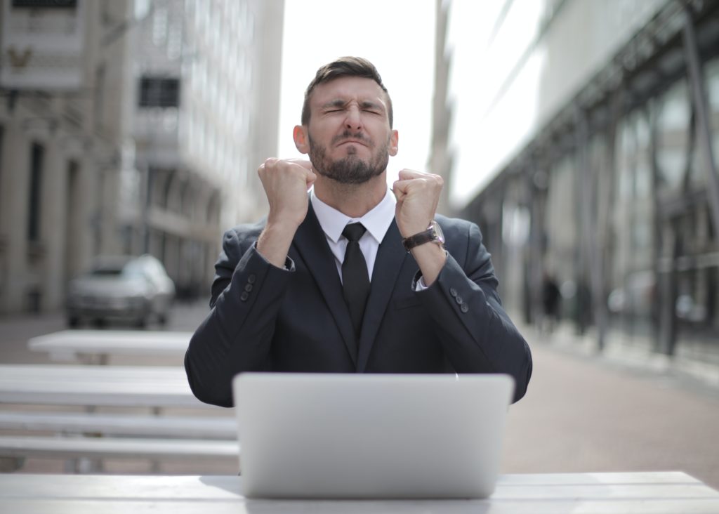 Person cheering his investment